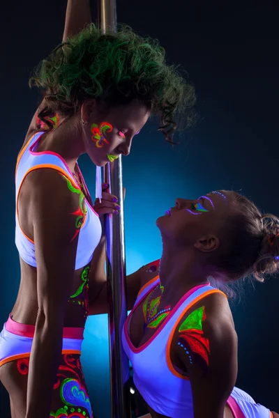 Artistic dancers with bright glowing bodyart — Stock Photo, Image