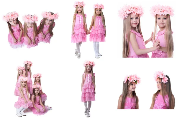 Conjunto de adorables niñas posan en vestidos rosas —  Fotos de Stock