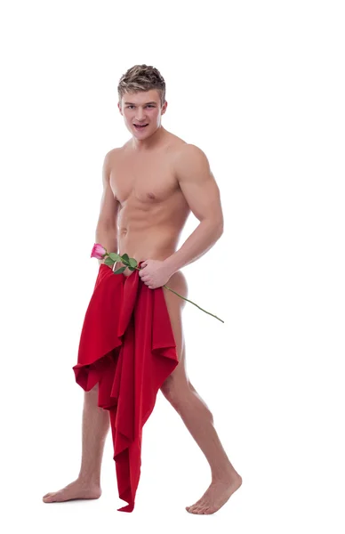 Merry nude man posing with rose. Isolated on white — Zdjęcie stockowe