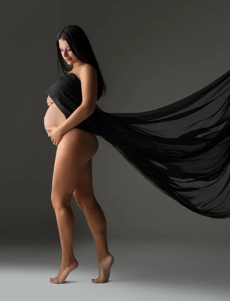 优雅的孕妇拍裸照用布 — 图库照片