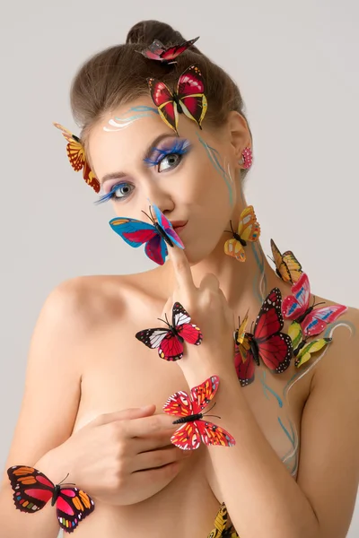 Portrait of beautiful naked girl with butterflies — Stock Photo, Image