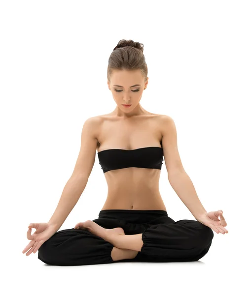 Yoga. Girl meditating sitting in lotus position — Stock Photo, Image