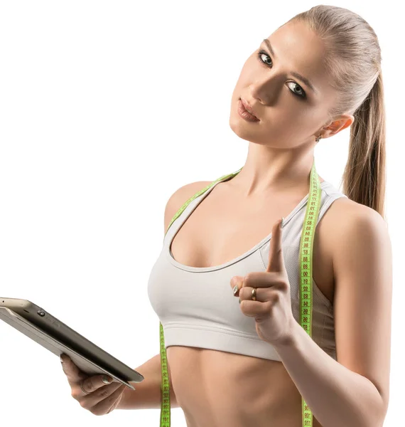 Fitness-Trainer mit Laptop und Maßband — Stockfoto