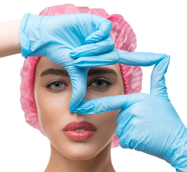 Woman in disposable cap and gloves isolated shot — Stock Photo, Image