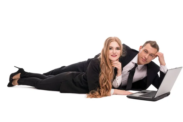 Delighted business partners using modern laptop together — Stock Photo, Image