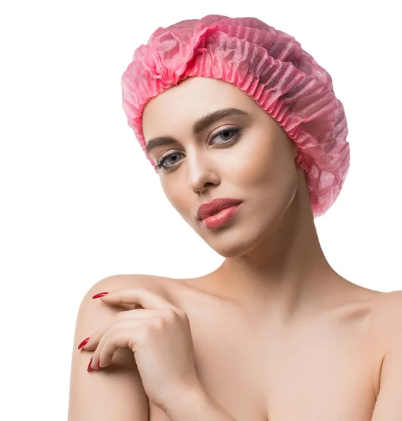 Ragazza in un monouso rosa cap isolato ritratto — Foto Stock