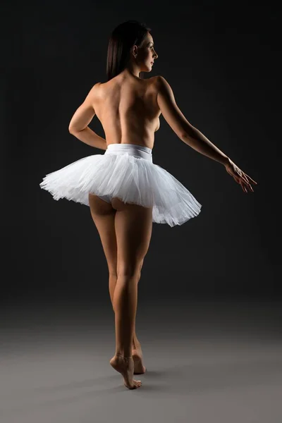 Sexy ballerina in tutu skirt in studio — Stok Foto