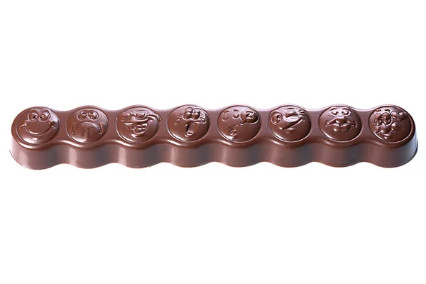 Delicious chocolate bar in form of smiles — Stock Photo, Image