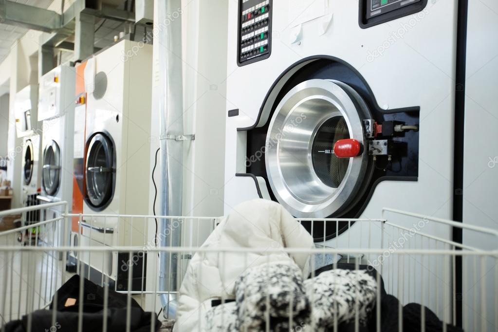 Modern washing machines in laundry room