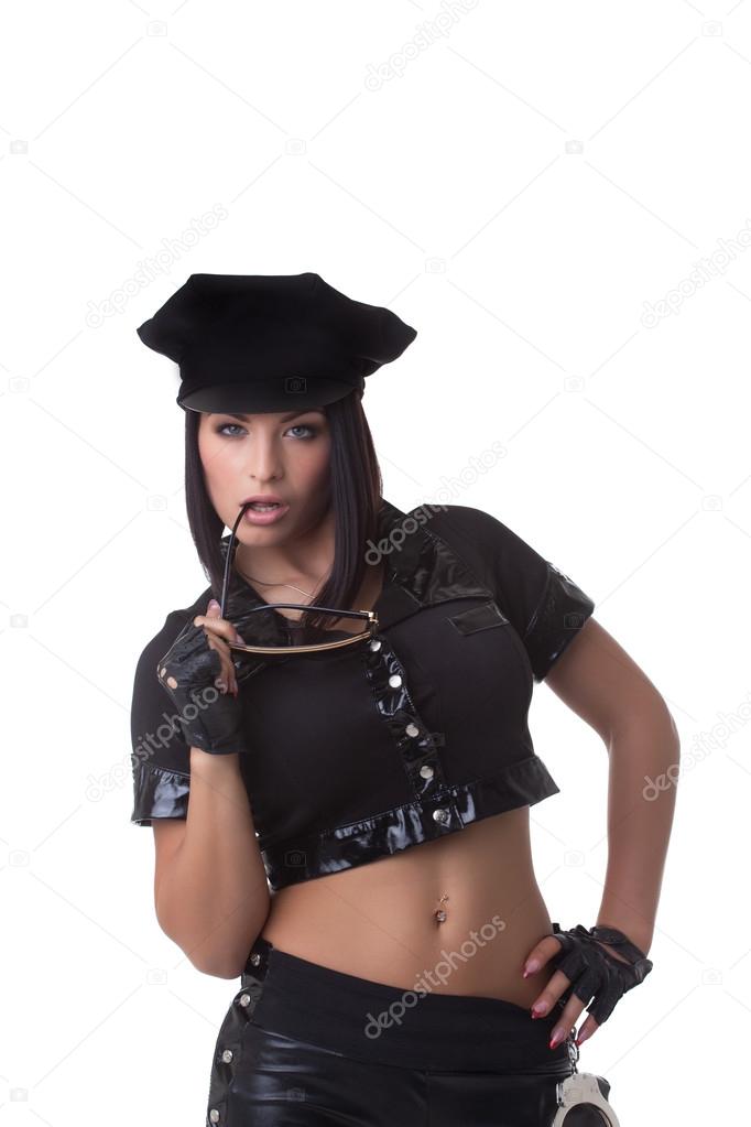 Sexy police woman invitingly looking at camera