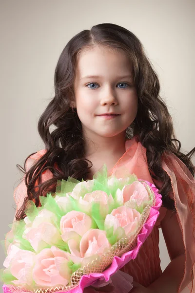 Lovely young girl with bouquet of paper tulips — Stock Photo, Image