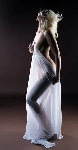 Studio shot of horny blonde posing with cloth — Stock Photo, Image