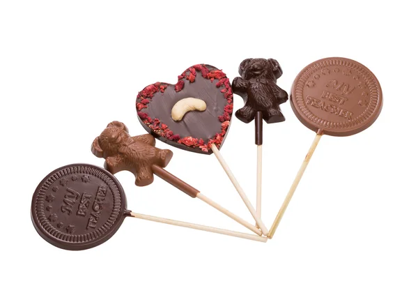 Veel heerlijke chocolade snoep op stick — Stockfoto
