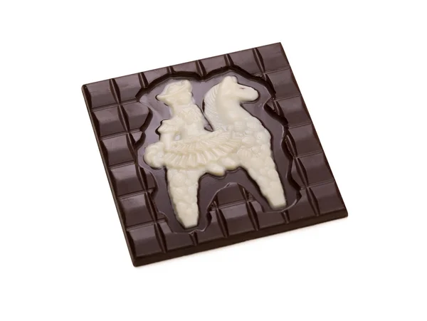 Chocolate bar with figurine of knight on horseback — Stock Photo, Image