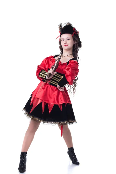 Odvážné mladá dívka pózuje v pirát kostým s pistolí — Stock fotografie