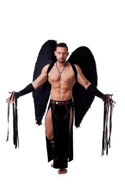 Male stripteaser dressed in suit of fallen angel — Stock Photo, Image