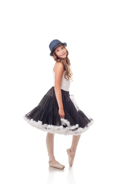 Pretty ballet dancer posing in dress and hat — Stock Photo, Image