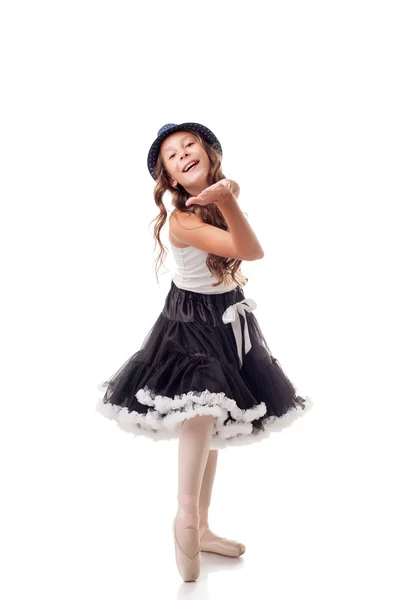 Cute young ballerina sends air kiss to camera — Stock Photo, Image