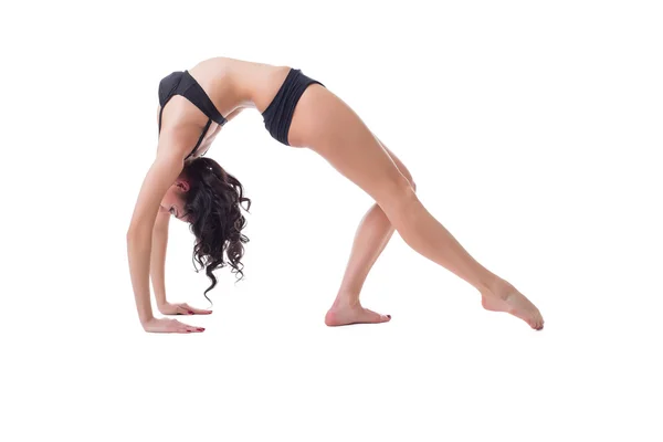 Flexible slim woman doing pilates exercise — Stock Photo, Image