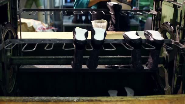 View of worker puts glue on rubber sole — Stock Video