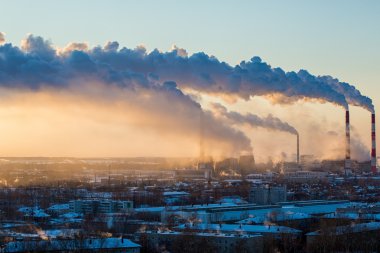 Smoke from thermal power plants rises above city
