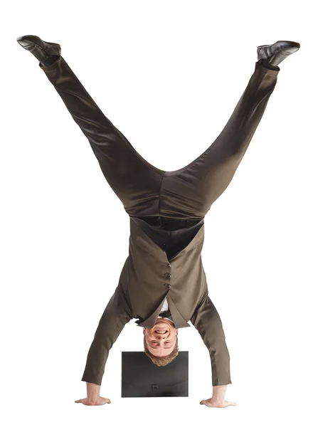 Smiling businessman standing on hands — Stock Photo, Image