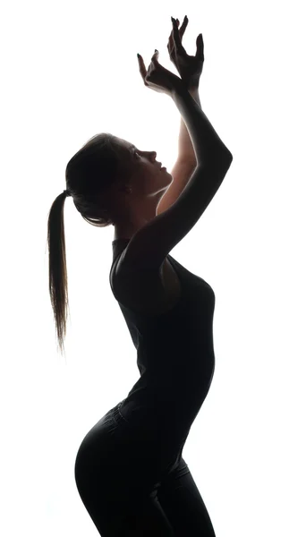 Silueta de la pequeña bailarina posando ante la cámara — Foto de Stock