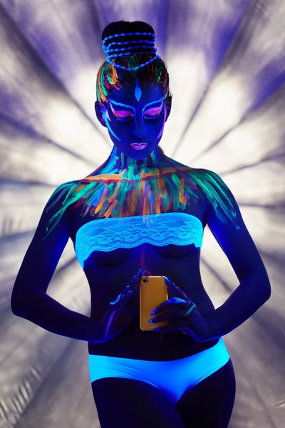 Amazing go-go dancer makes selfie under neon light — Stock Photo, Image