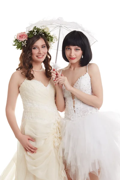 Krásné nevěsty. Koncept dvojí svatební — Stock fotografie