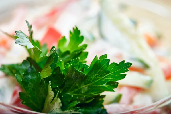 Close-up of fresh parsley in salad — Stock Photo, Image