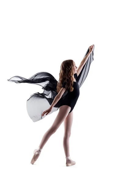 Smiling curly ballerina dancing with cloth — Stock Photo, Image