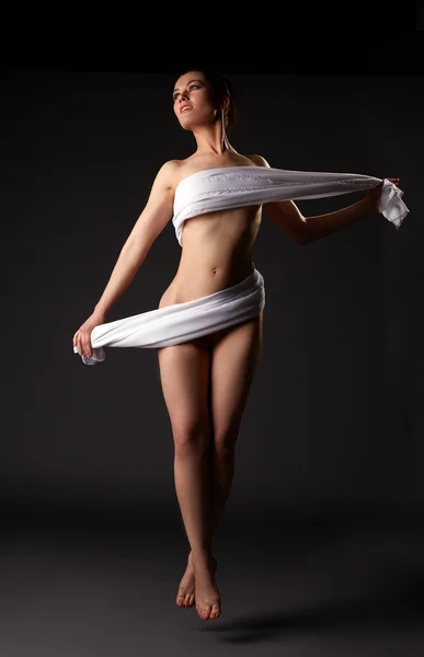 Obrázek svůdné ženské tanečník stoupající do vzduchu — Stock fotografie