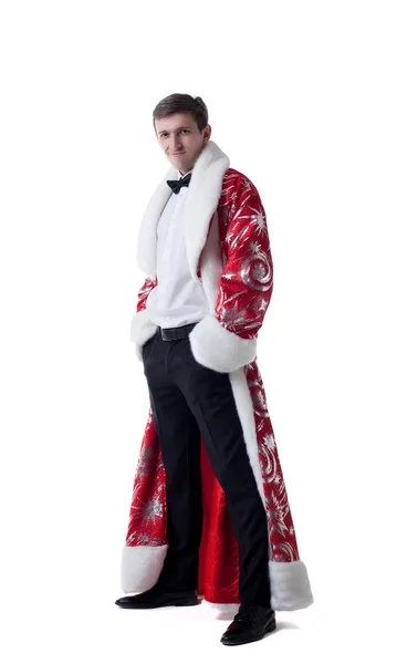 Elegant man poserar i pälsen av jultomten — Stockfoto