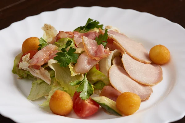 Meat slicing, vegetable salad and cheese balls — Stock Photo, Image