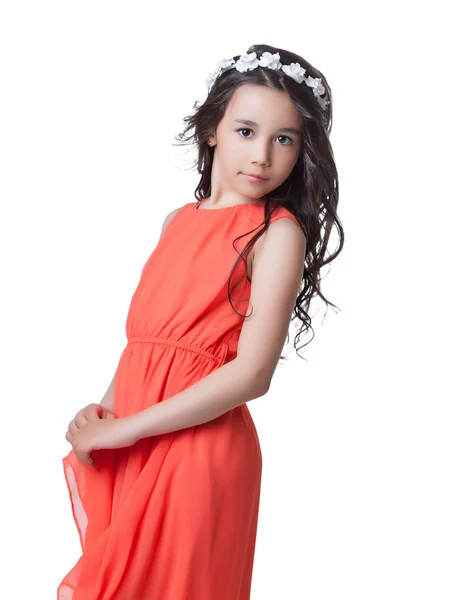 Adorable little model posing in stylish red dress — Stock Photo, Image