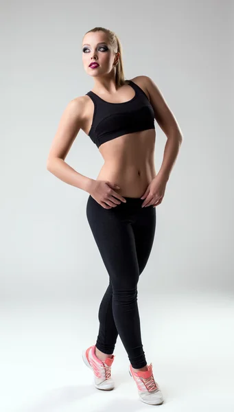 Image of beautiful female athlete posing in studio — Stock Photo, Image