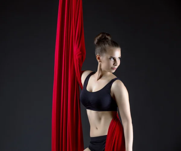 Studio portrait of charming young acrobat — Stock fotografie