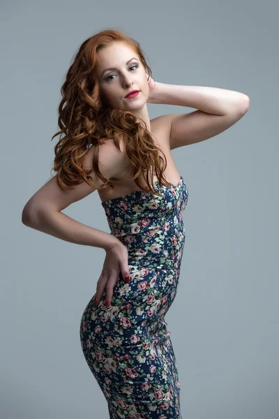 Pretty freckled model posing in skin-tight dress — Stock Photo, Image