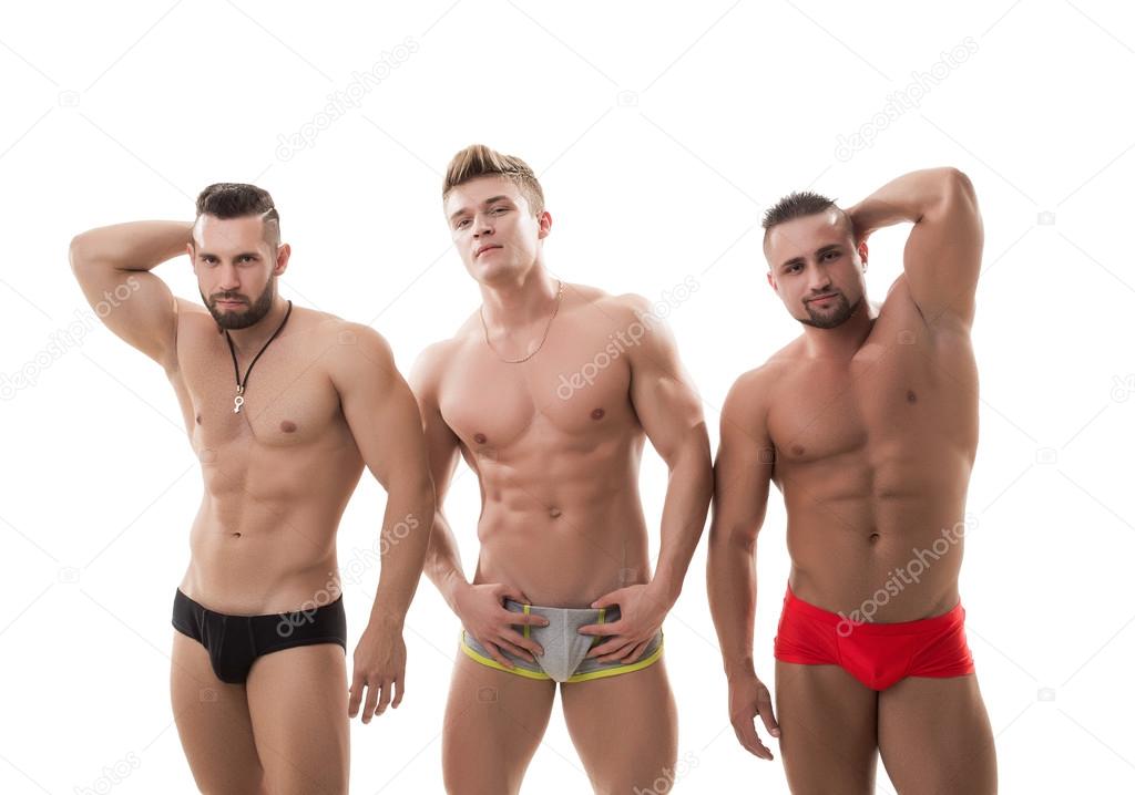 Sexy male models posing, isolated on white