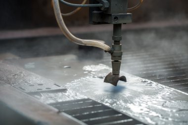 Image of modern waterjet cutting machine for metal clipart