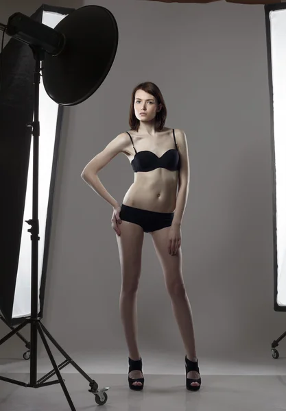 Image of leggy girl posing in studio photography — Stock Photo, Image