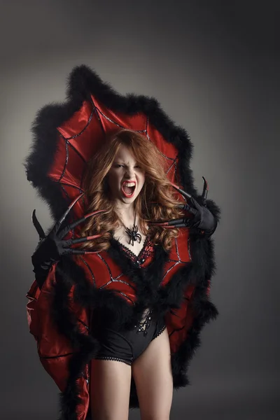 Halloween. Screaming girl dressed as Spider Queen — Stock Photo, Image