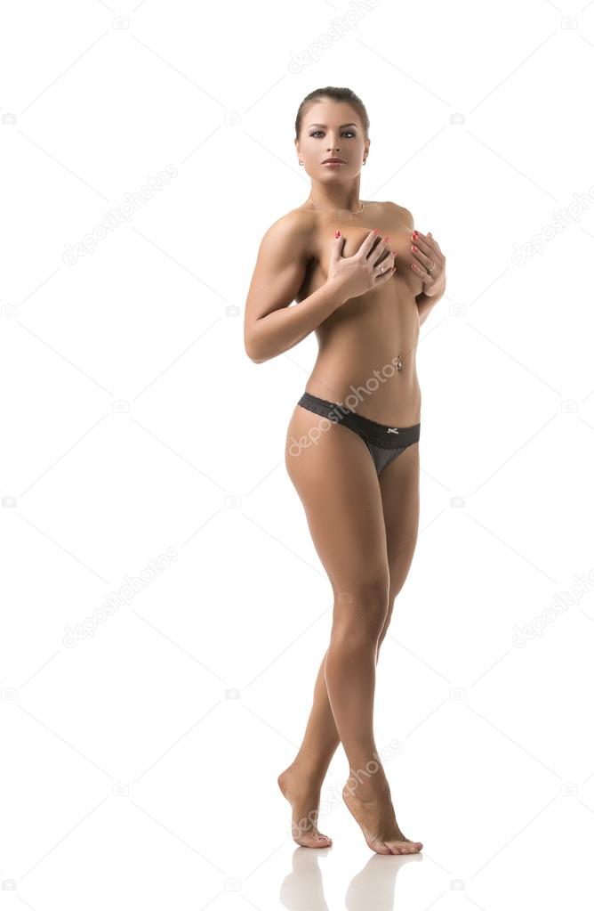 Seductive female athlete posing nude to waist