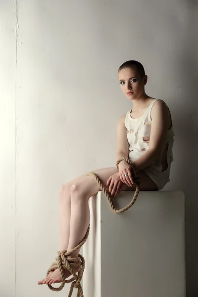 Girl with tied limbs posing as mentally ill person — Stock Photo, Image