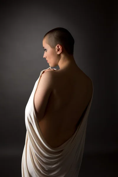 Back view of defenseless woman with shaved head — Stock Photo, Image