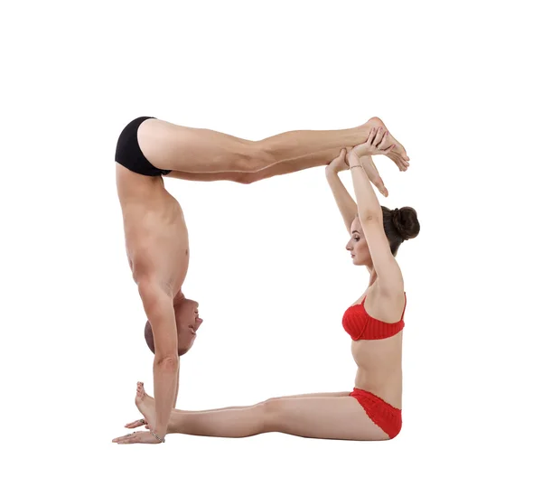 Flexible yogis formed letter O with their bodies — Stock Photo, Image