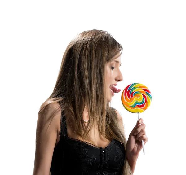 Image of sexy young brunette licking lollipop — Stock Photo, Image