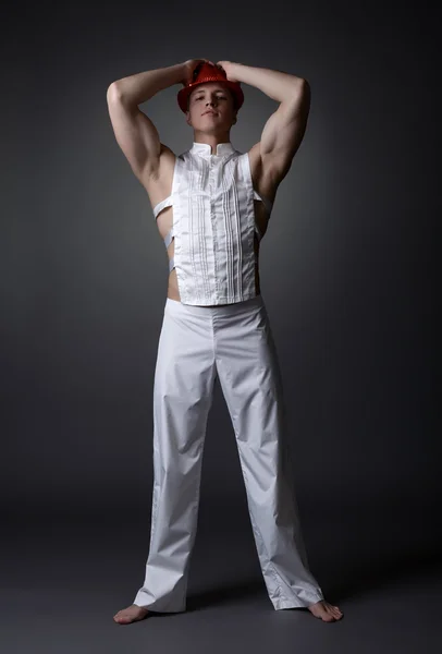 Elegantly dressed stripper posing at camera — Stock Photo, Image