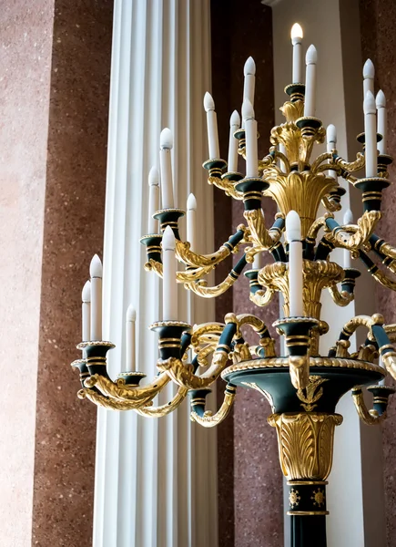 Big old torchere with candlesticks — Stock Photo, Image