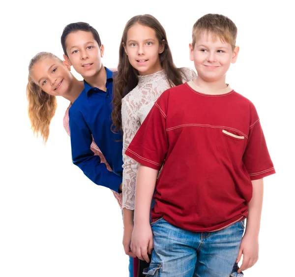 Funny teenage children standing one by one — Stock Photo, Image